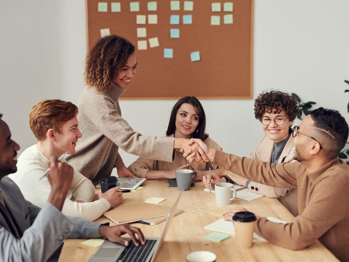 Team discussing employee benefits